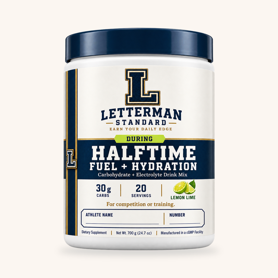 Half-Time Fuel + Hydration Lemon Lime 20-serving tub on a warm cream background.